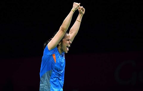 Saina Nehwal celebrates her victory over her India's Venkata Pusarla in their badminton women's single final match at the 2018 Gold Coast Commonwealth Games in Gold Coast on April 15, 2018.  Saeed KHAN / AFP