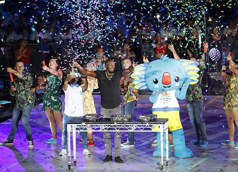 Usain Bolt, retired Jamaican sprinter and world record holder in the 100 and 200 meters, performs as a DJ at Carrara Stadium during the closing ceremony of the 2018 Commonwealth Games on the Gold Coast, Australia, April 15, 2018. (AP Photo)