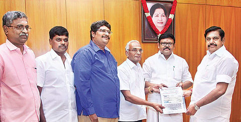 S Vairavan, secretary, Booksellers and Publishers’ Association of South India, handing over a cheque of `2 lakh to  Chief Minister Edappadi K Palaniswami to set up Tamil Chair in Harvard University, on Monday | Express