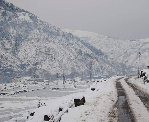 In this file photo, the Mughal road, which connects Rajouri and Poonch district, is draped in white following snowfall.  (PTI)