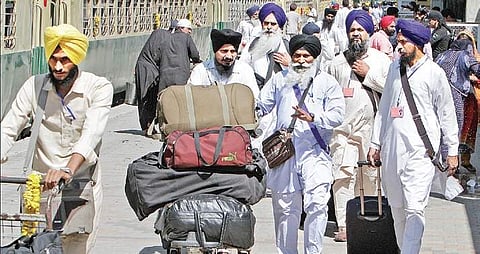 Indian Sikh pilgrims at Wagha border on way to attend Baisakhi festival at the shrine of Gurdwara Punja Sahib Pakistan. | PTI