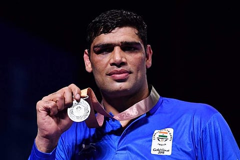 Indian boxer Satish Kumar Yadav won the silver medal in the men's 91kg boxing event at Gold Coast (File Photo | AFP)