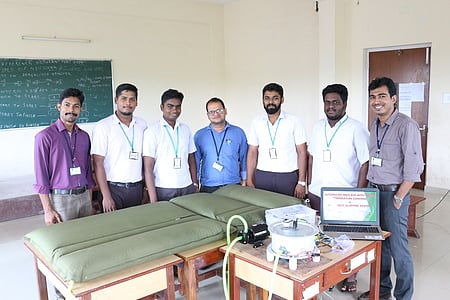 AISAT students Joseph Sen,  Ashwin Stanly, Jeswin Joseph and Shevin K A along with guides Nobin Paul, Thomas Felix and Tiju Baby with the newly developed ‘Medibed’