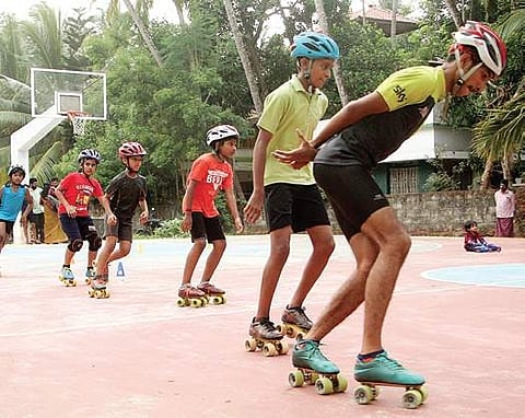 Young skaters practice at a basketball court in Kozhikode |  T P Sooraj
