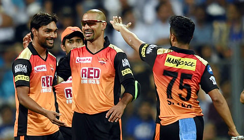 Sunrisers Hydrabad bowler Sandeep Sharma celebrates the wicket of Mumbai Indans batsman Evin Lewis during the IPL match played in Mumbai on Tuesday. | PTI