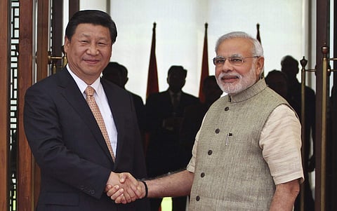 Prime Minister Narendra Modi, right, shakes hand with Chinese President Xi Jinping(File | AP)