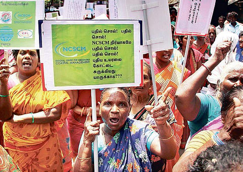 Fishing community protesting in front of Chennai Collectorate on Wednesday. | Express