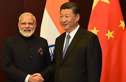 PM Narendra Modi and Chinese President Xi Jinping. (File Photo: Twitter via @MEAIndia)