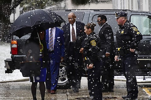 Bill Cosby, center, arrives for jury selection in his sexual assault retrial at the Montgomery County Courthouse, Monday, April 2, 2018, in Norristown, Pa. (AP Photo/Corey Perrine)