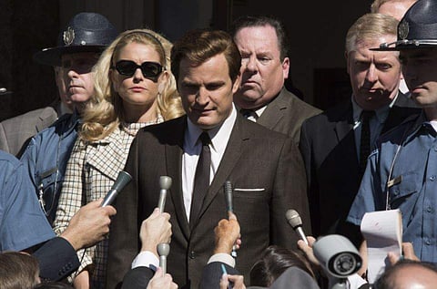 This image released by Entertainment Studios shows Jason Clarke as Ted Kennedy, center, and Andria Blackman stars as Joan Kennedy in a scene from Chappaquiddick. | AP