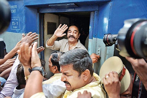 Actor-turned politician Kamal Haasan leaving for Tiruchy onboard Vaigai Express from Chennai Egmore station on Tuesday. | (Sunish P Surendran | EPS)