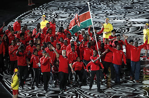 Team Kenya is lead by flag bearer Elijah Manangoi at Carrara Stadium for the opening ceremony for the 2018 Commonwealth Games (File | AP)