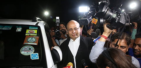 Senior Congress leader Abhishek Singhvi arrives at  Supreme Court for the hearing of Congress & JD(S) petition challenging Karnataka Governors decision  in New Delhi on Thursday. (Express photo | Shekhar Yadav)