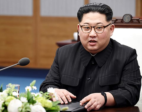 In this April 27, 2018, photo, North Korean leader Kim Jong Un speaks with South Korean President Moon Jae-in at Peace House of the border village of Panmunjom in the Demilitarized Zone, South Korea. | AP