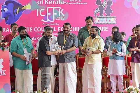 The New Indian Express, Thiruvananthapuram bureau, bags the award for 'Best Reporting' in English Daily category in the International Children's Film Festival of Kerala 2018.  Anil S, Bureau Chief, receives the award from Speaker P Sreeramakrishnan as Ker