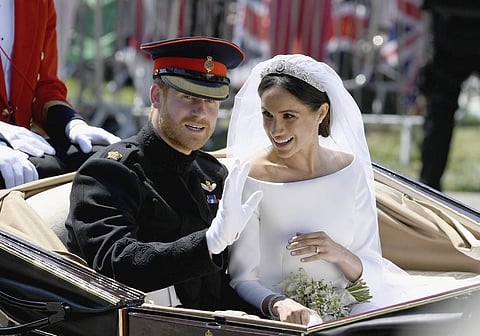 ROYAL LOVE: Prince Harry and Meghan Markle gazed into each other's eyes and pledged their lifelong love on Saturday as they married in front of hundreds of royals, celebrities and friends at St. George's Chapel and millions of TV viewers around the world.