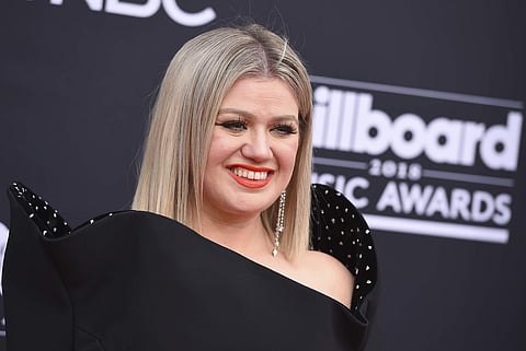 Kelly Clarkson arrives at the Billboard Music Awards at the MGM Grand Garden Arena on Sunday, May 20, 2018, in Las Vegas. | AP