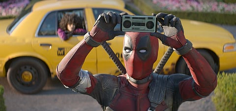 This image released by Twentieth Century Fox shows Ryan Reynolds in a scene from 'Deadpool 2.' | Associated Press