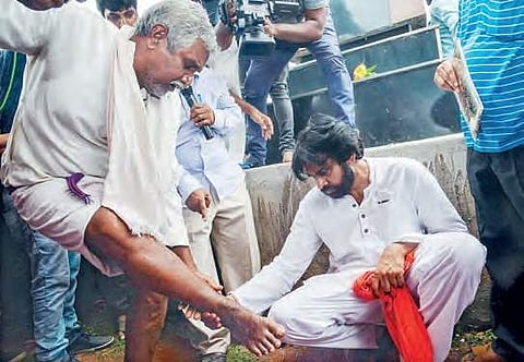 Jana Sena Party chief Pawan Kalyan interacts with farmers at Sompeta  on Monday   | Express