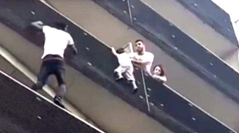 Mamoudou Gassama's spectacular rescue. (Photo | Twitter)