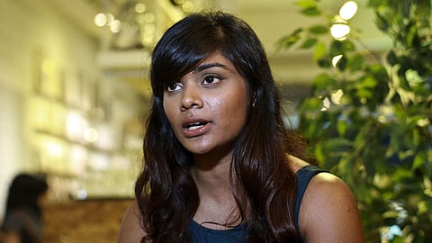 Grace Nathan, whose mother Anne Daisy was on board the missing Malaysia Airlines MH370, talks to journalists at a restaurant in Kuala Lumpur, Malaysia, Tuesday, May 29, 2018. 
