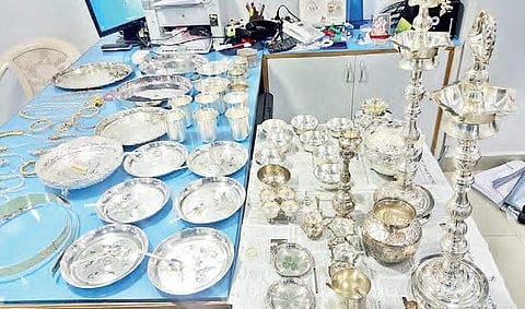 Gold ornaments and silver articles seized from tainted peon K Narasimha Reddy’s bank lockers on Wednesday | Express