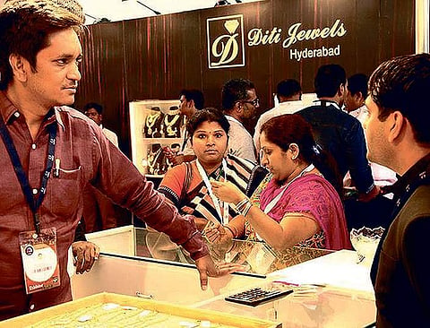 Miniature jewellery, Lord Ganesh with gold dhoti at Jewellery Fair