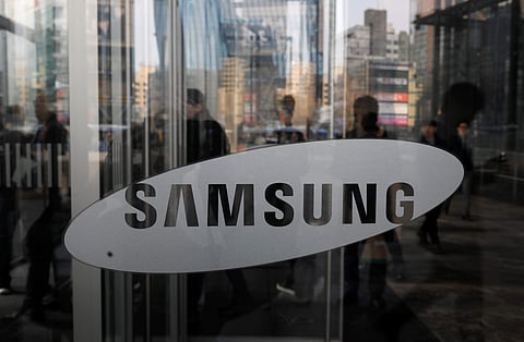 The logo of Samsung Electronics is seen at its office building in Seoul. (Photo | Reuters)