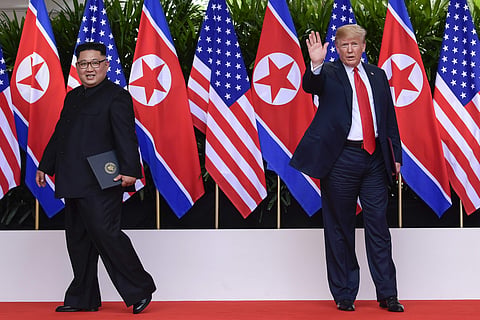 President Donald Turmp waves as North Korea leader Kim Jong Un leaves after their meetings at the Capella resort on Sentosa Island Tuesday, June 12, 2018 in Singapore. (Photo: AP)
