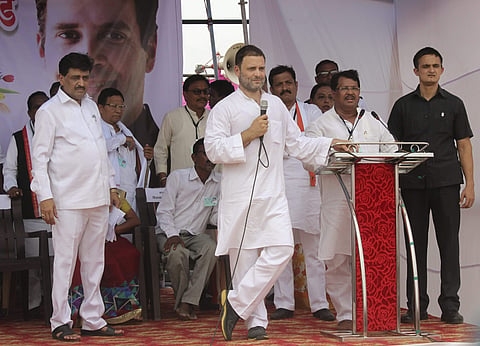 Congress president Rahul Gandhi speaks during 'Chaupal pe Charcha' an interaction session with farmers at Nanded village in Chandrapur district of Maharashtra on Wednesday June 13 2018. | PTI