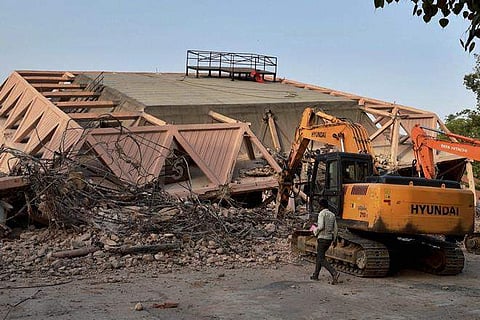 The iconic Hall of Nations structure at Pragati Maidan being demolished in New Delhi. (File | PTI)