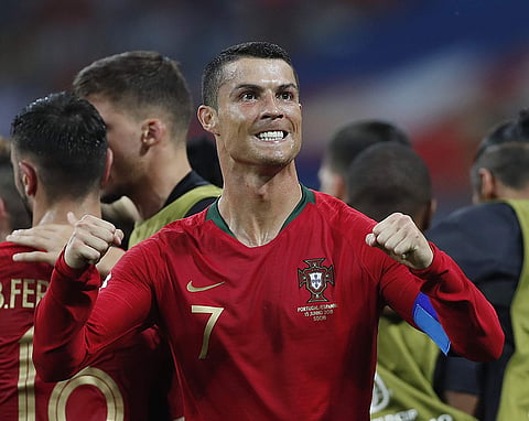 Captain Cristiano Ronaldo scored a stunning hat-trick as Portugal snatched a 3-3 draw with Spain in a World Cup classic in Russia's Sochi Friday. (Photo | AP)