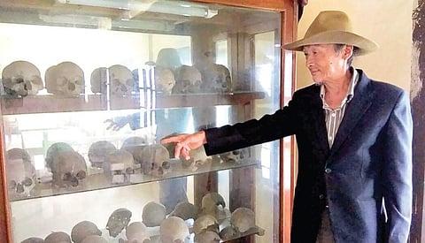 Naga tribe chieftain lives with skulls to preserve history