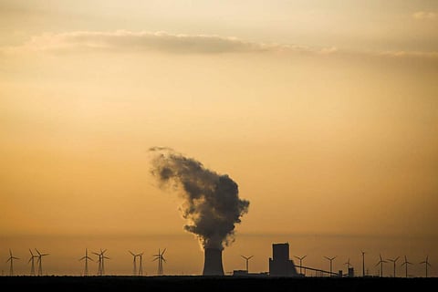 0 1 In this Tuesday, June 5, 2018 photo, steam rises in the air from the brown coal power plant Schwarze Pumpe in the Lusatia, (Lausitz) area in Germany.  | AP