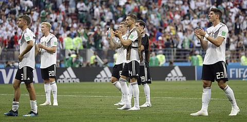 Defending champions Germany crashed to defeat in their first game at the World Cup on Sunday as an enterprising Mexico refused to be intimidated by history and ran out 1-0 winners in a thrilling Group F opener. A shaky warm-up campaign had called into question the dominant form the Germans showed in qualifying, but experience and records were on their side, having won every opening game at major tournaments since Joachim Loew took over as coach in 2006. | AP