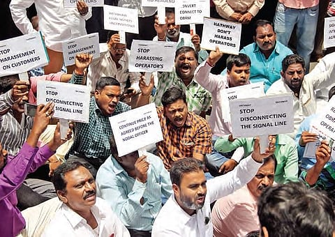 Cable TV operators staged a protest in front of Hathway cable on Monday, demanding a relook at the revised tariff and to end ‘discriminatory practices’, in Hyderabad | Sathya Keerthi