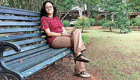 Vidya Athreya; (left) a file photo of Ajoba with Vidya and her team
