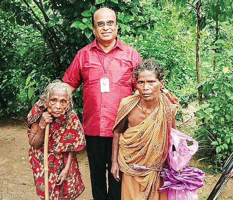 Dr NB Jayaprakash with two elderly widows from Ghathaon, Odisha