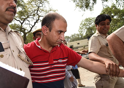 Accused Army Major Nikhil Rai Handa being taken by police to be produced at Patiala Court New Delhi on Monday, June 25 2018. (EPS | Parveen Negi)