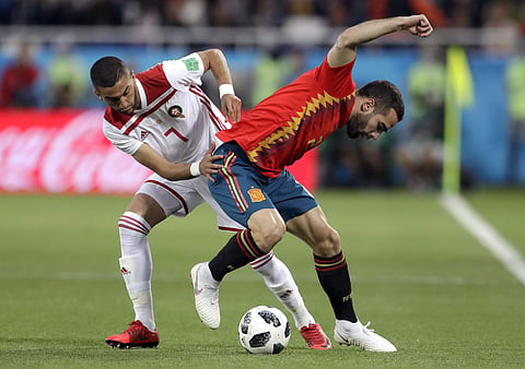 The first day of World Cup teams playing simultaneous matches to see who advances came down to the wire as Spain and Portugal both needed at least a draw to qualify for the knockouts. (Photo | AP)