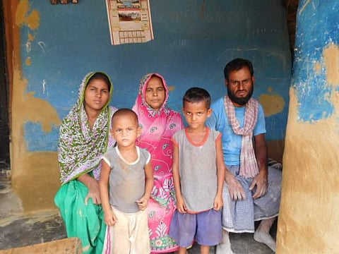 Victim Sheikh Shajahan's daughter Shabana Khatun, wife Hanufa Bibi and eldest son Sheikh Imran along with two of his sons, at their residence in Bhursa village in Arsha block of Purulia district in West Bengal on Tuesday. I Aishik Chanda