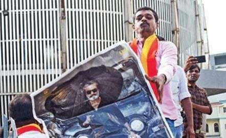 Member of a pro-Kannada organisation protests outside Urvashi theatre. (EPS)