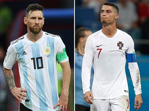 Argentina striker Lionel Messi and Portugal striker Cristiano Ronaldo | AFP