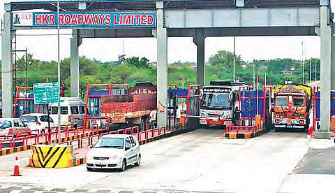 File picture of a toll plaza operated by HKR Roadways Ltd, where tolls have been hiked recently| EXPRESS