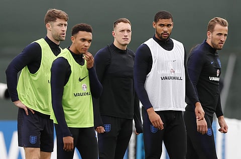 England's Gary Cahill, left with teammates Trent Alexander-Arnold, Phil Jones, Ruben Loftus-Cheek, and Harry Kane take part in a training session for the England team. (Photo | AP)