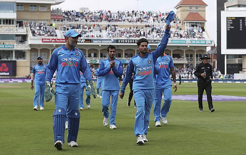 India's Kuldeep Yadav, center right, acknowledges the crowd at the end of the England innings during the first ODI between England and India at Trent Bridge, Nottingham, England, Thursday, July 12, 2018. | AP
