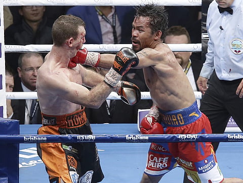 Manny Pacquiao of Philippines lands a punch on Australia's Jeff Horn in his last professional bout last year. ( File  | AP)