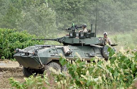 An armored vehicle from the US Marines takes part in a field drill during a joint military drill with Japan's Ground Self-Defense Force (Photo |AFP)