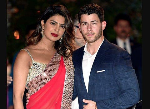 Priyanka Chopra and American singer-songwriter Nick Jonas at Akash Ambani and Shloka Mehta's pre-engagement ceremony. | PTI File Photo