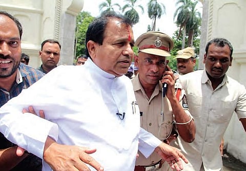 A police personnel takes away BJP MLA Chintala Ramchandra Reddy for trying to enter Pragathi Bhavan to give a representation to Chief Minister K Chandrasekhar Rao, in Hyderabad on Tuesday | S Senbagapandiyan